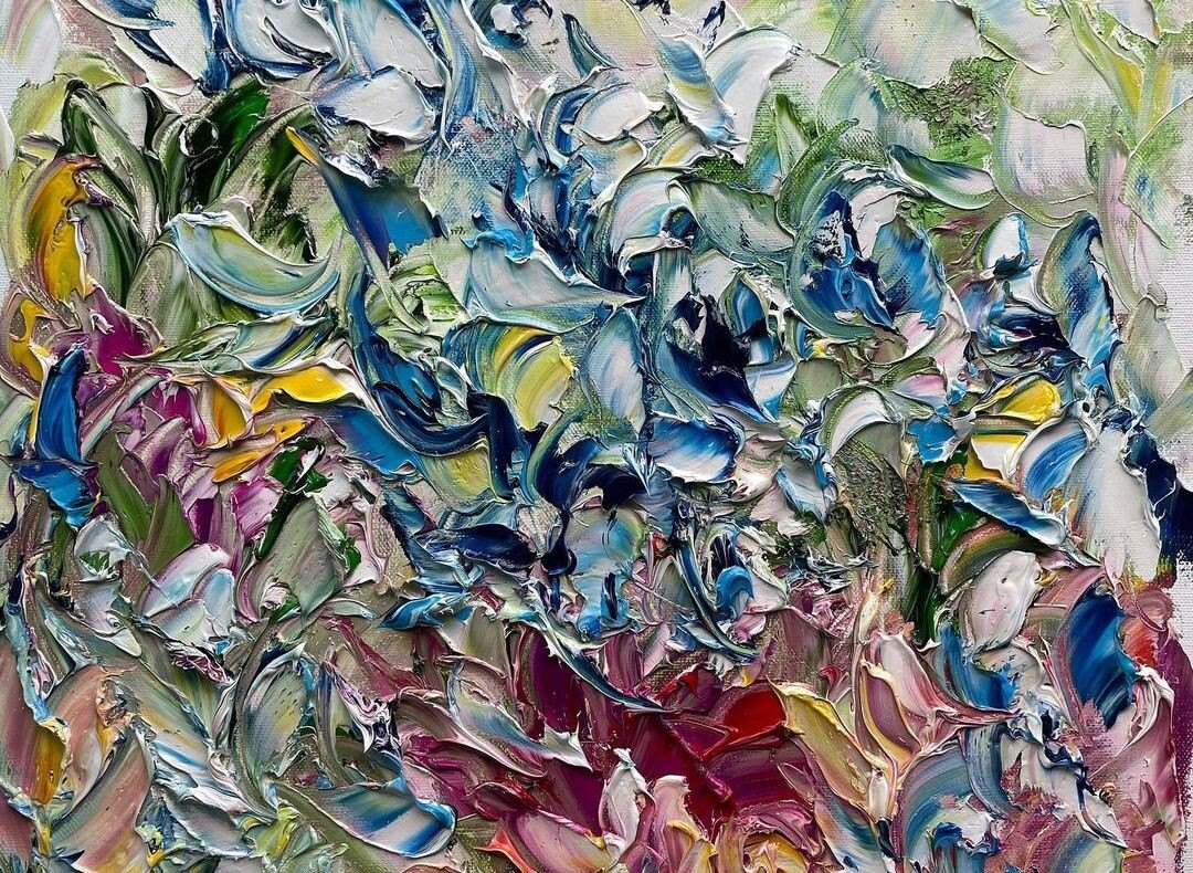Thick impasto painting detail with blue, white, green, yellow and magenta palette knife strokes
