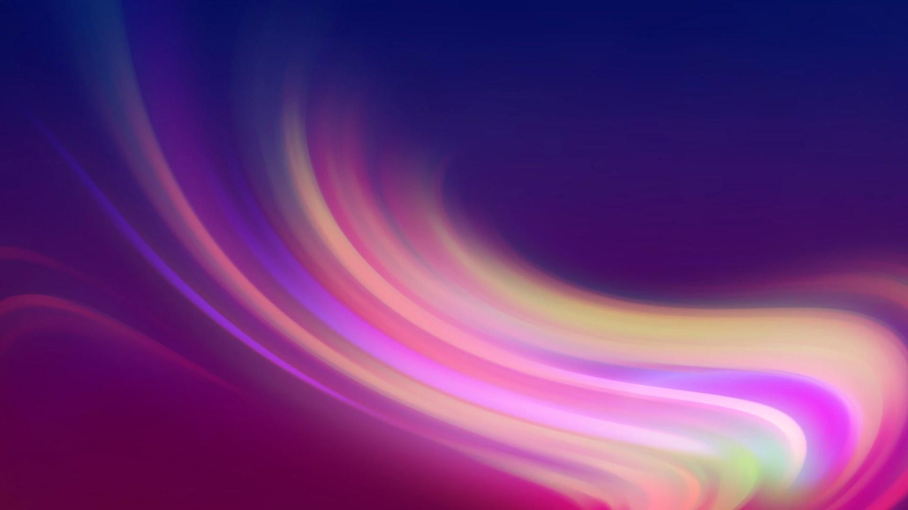 Abstract swirling purple, pink and yellow light streaks on a dark blue background