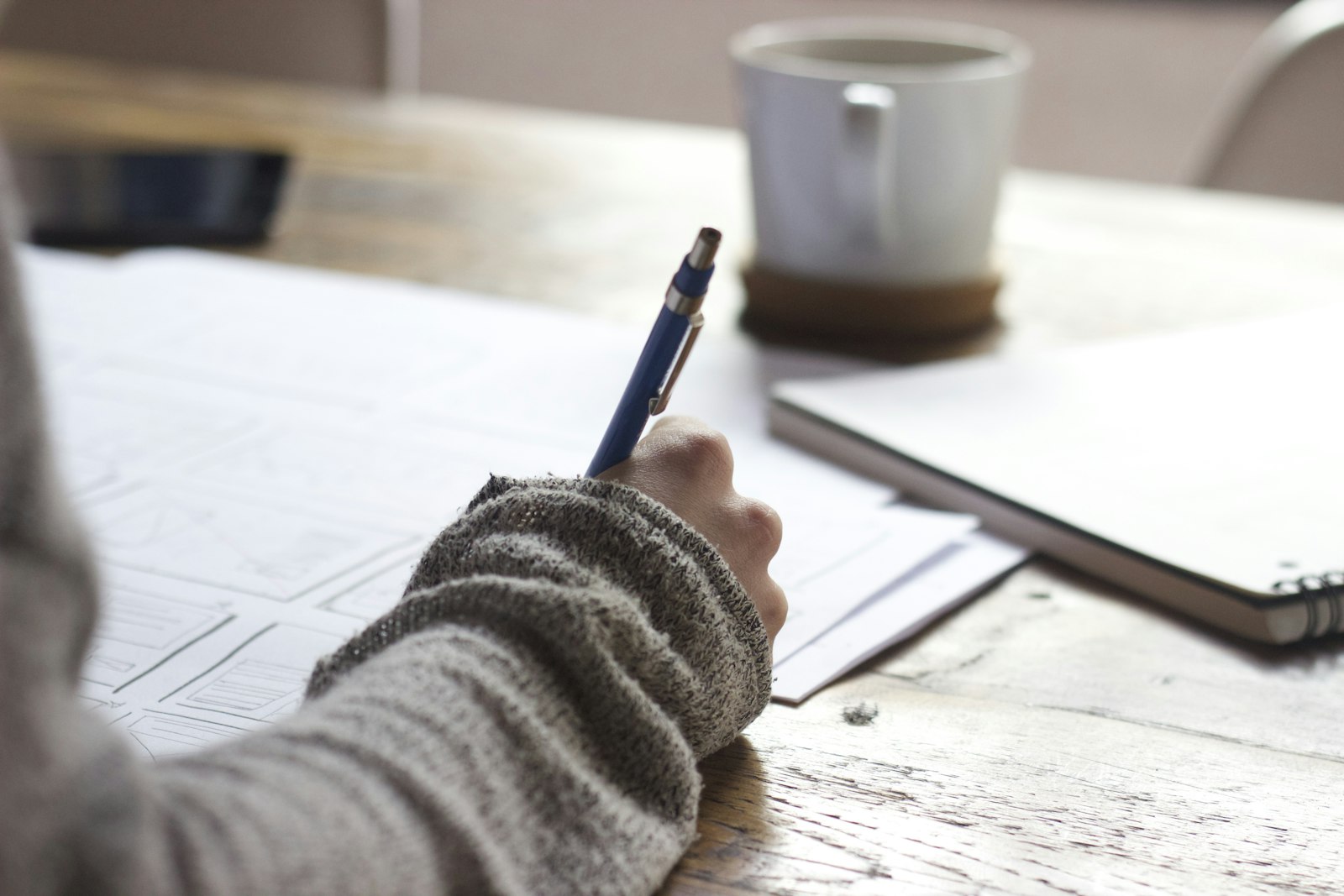 Notebook with a handwritten savings plan